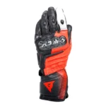 The Dainese Druid 4 leather racing gloves are an expression of the highest protection standards, designed for maximum performance on the track and the road. World Championship safety and ergonomics are guaranteed by the presence of the pre-curved and thermoformed sleeve, the carbon inserts on the knuckles and back, and the thermoplastic protector on the little finger. They are guaranteed to be resistant owing to the polyurethane inserts on the palm and joints, while four-way stretch ensures extreme comfort and a perfect fit at all times.