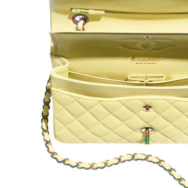 "Discover timeless elegance with the Chanel Classic 11.12 Handbag in vibrant yellow. Elevate your style with iconic luxury. Shop now!"