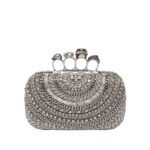 Alexander McQueen Women's knuckle clutch in silver.