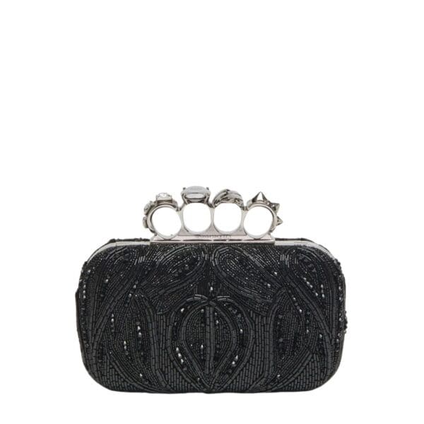 Alexander McQueen Women's knuckle clutch in black.