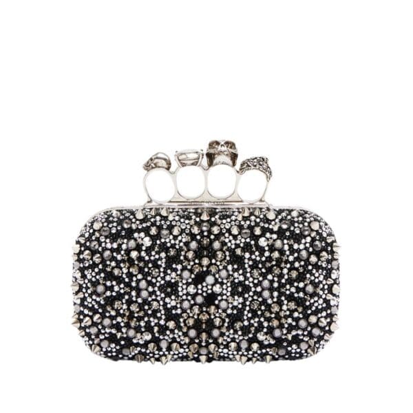 Alexander McQueen Women's knuckle clutch in black.