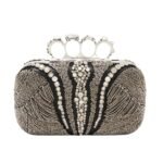Alexander McQueen Women's knuckle clutch in silver.