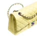 "Discover timeless elegance with the Chanel Classic 11.12 Handbag in vibrant yellow. Elevate your style with iconic luxury. Shop now!"