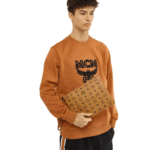 MCM MEDIUM WRISTLET ZIP POUCH IN VISETOS ORIGINAL COGNAC