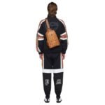 MCM SMALL AREN SLING BAG IN VISETOS COGNAC