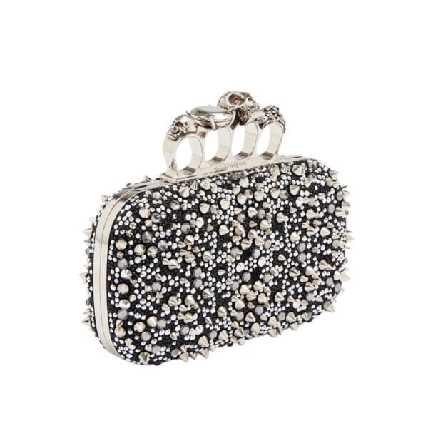 Alexander McQueen Women's knuckle clutch in black.