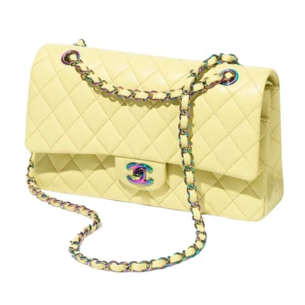 "Discover timeless elegance with the Chanel Classic 11.12 Handbag in vibrant yellow. Elevate your style with iconic luxury. Shop now!"