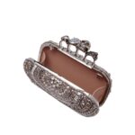 Alexander McQueen Women's knuckle clutch in silver.