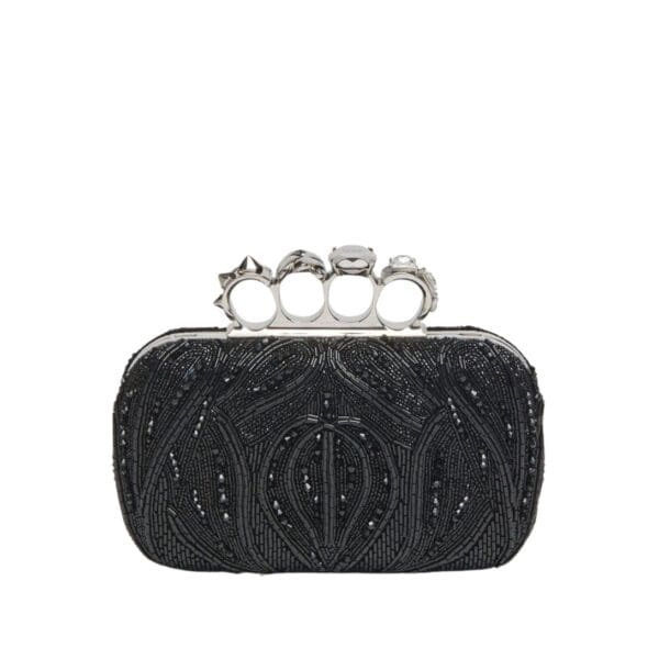 Alexander McQueen Women's knuckle clutch in black.