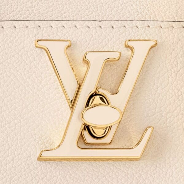 LOUIS VUITTON LOCK AND WALK