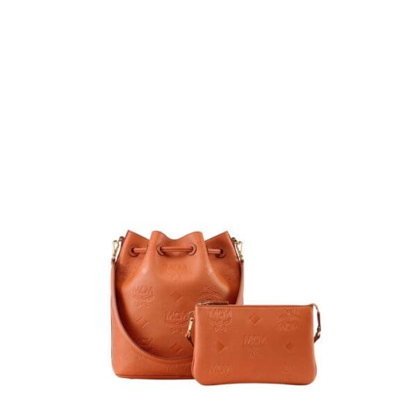 MCM MEDIUM DESSAU DRAWSTRING IN EMBOSSED MONOGRAM LEATHER BROWN