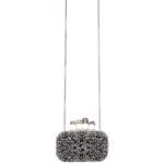 Alexander McQueen Women's knuckle clutch in black.