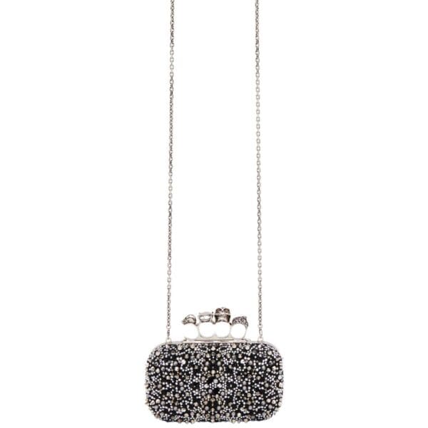 Alexander McQueen Women's knuckle clutch in black.