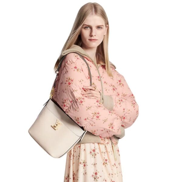 LOUIS VUITTON LOCK AND WALK