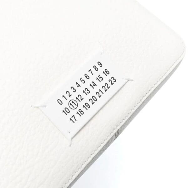 MAISON MARGIELA LOGO-APPLIQUÉ CROSSBODY BAG