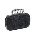 ALEXANDER MCQUEEN WOMANS KNUCKLE CLUTCH IN BLACK