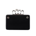 ALEXANDER MCQUEEN MANS THE KNUCKLE TWISTED CLUTCH IN BLACK