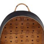 MCM STARK BACKPACK IN EMBOSSED LOGO LEATHER BLACK