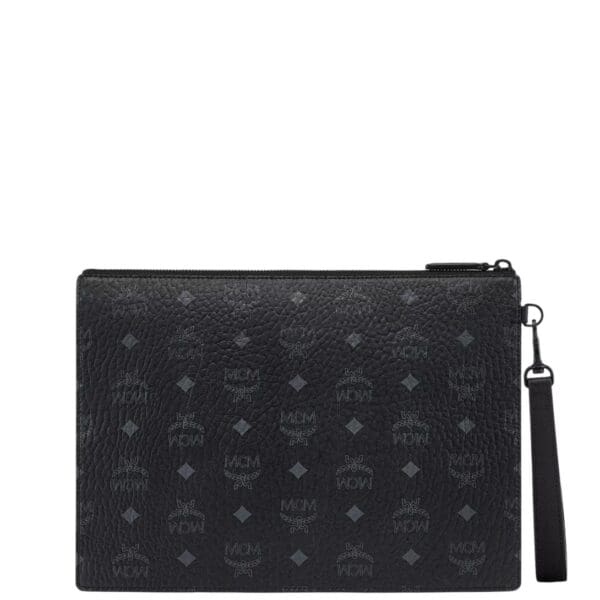 Enter the realm of refined elegance with the medium-sized zip pouch, a consummate clutch that seamlessly marries maximalist form with real-world functionality. Crafted with meticulous attention to detail, this accessory stands as a testament to the enduring allure of signature Visetos monogram canvas and sumptuous nappa leather. Measuring approximately 2.0 x 11.8 x 8.5 inches, this zip pouch strikes the perfect balance between spaciousness and sleekness, offering ample room for your essentials while maintaining a sophisticated silhouette that exudes timeless charm. The detachable leather wristlet strap, with a strap drop of 7.9 inches, provides hands-free wear, allowing for effortless transitions from day to night with ease and grace. Exemplifying the brand's commitment to quality craftsmanship, this zip pouch features the iconic MCM logo plate, a symbol of prestige and excellence. The zip closure ensures the security of your belongings while maintaining easy accessibility, providing peace of mind as you navigate your day. Inside, the pouch boasts an interior zip pocket, thoughtfully designed to keep your valuables organized and within reach. The nylon lining adds a touch of luxury while providing durability and protection for your belongings, ensuring they remain pristine throughout your journeys. Crafted from the finest materials, including Visetos monogram canvas and nappa leather trim, this zip pouch exudes sophistication and refinement. Matte black metal hardware accents the pouch's aesthetic with a modern edge, elevating its allure to new heights. Handcrafted with care in South Korea, each zip pouch is a testament to meticulous craftsmanship and dedication to excellence, promising a seamless fusion of style and functionality. Whether used as a standalone accessory or as part of a larger ensemble, this pouch is sure to make a statement, exuding timeless elegance and effortless sophistication wherever you go.
