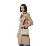 The Versace Barocco Athena Extra Small Tote Bag is an exquisite fusion of opulence, sophistication, and timeless elegance. Crafted with meticulous attention to detail, this iconic piece encapsulates the essence of the Versace brand, showcasing its signature Barocco motif and distinctive design elements. At first glance, the bag exudes a sense of luxury, boasting a striking combination of rich textures and vibrant hues. The Barocco motif, synonymous with Versace's heritage, adorns the exterior of the bag, intricately woven into the fabric with precision and finesse. Its bold and intricate patterns pay homage to classical Greek and Roman art, adding a touch of regal grandeur to the design. Constructed from premium materials of the highest quality, the tote bag is both durable and luxurious. The supple leather exterior is soft to the touch, while the gleaming gold-tone hardware adds a touch of glamour and refinement. The structured silhouette maintains its shape effortlessly, exuding an air of sophistication and poise. Practical yet stylish, the Extra Small Tote Bag is designed to cater to the modern woman's lifestyle. Despite its compact size, the interior offers ample space to accommodate essentials such as keys, phone, wallet, and makeup, making it ideal for both day-to-day use and special occasions. The interior is lined with sumptuous satin fabric, providing a luxurious backdrop for your belongings. Versatility is another hallmark of this timeless accessory. Whether carried by the top handles for a polished look or slung over the shoulder using the detachable strap for added convenience, the tote bag effortlessly transitions from day to night, complementing any ensemble with effortless sophistication. In conclusion, the Versace Barocco Athena Extra Small Tote Bag is a true masterpiece that embodies the epitome of luxury and style. With its exquisite craftsmanship, iconic design, and practical functionality, it is more than just a fashion accessory—it is a symbol of prestige, refinement, and enduring elegance.