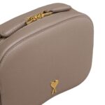 AMI PARIS PARIS CAMERA BAG IN LIGHT TAPUE