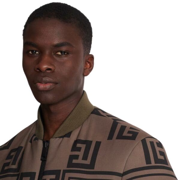 BALMAIN REVERSTIBLE MINI MONOGRAM BOMBER JACKET