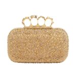 ALEXANDER MCQUEEN WOMANS KNUCKLE CLUTCH IN GOLD
