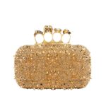ALEXANDER MCQUEEN WOMANS KNUCKLE CLUTCH IN GOLD