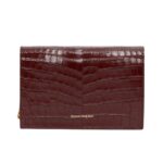 ALEXANDER MCQUEEN WOMANS SMALL SKULL IN RED