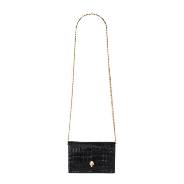 ALEXANDER MCQUEEN WOMANS SMALL SKULL IN BLACK