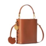 STELLA MCCARTNEY VEUVE CLICQUOT WOVEN BUCKET BAGSTELLA MCCARTNEY VEUVE CLICQUOT WOVEN BUCKET BAG