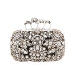 Alexander McQueen Women's Victorian Jewel Knuckle Clutch in Silver: an exquisite blend of vintage charm and modern elegance, adorned with ornate jewels.