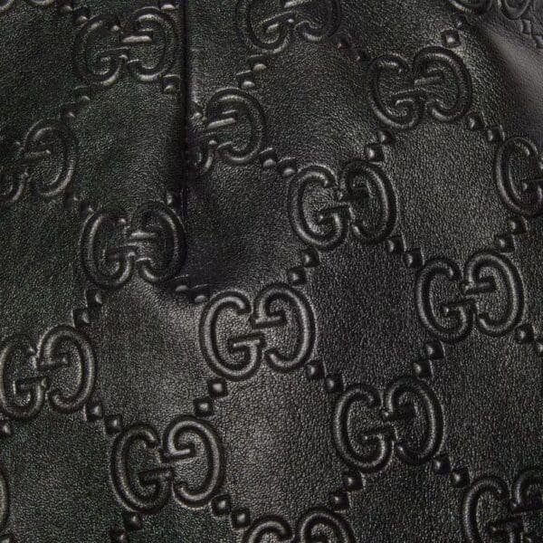 GUCCI GG EMBOSSED LEATHER SHORTS