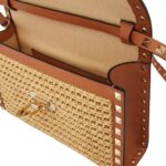 VALENTINO GARAVANI SMALL ROCKSTUD SHOULDER BAG IN WOVEN RAFFIA