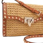 VALENTINO GARAVANI SMALL ROCKSTUD SHOULDER BAG IN WOVEN RAFFIA