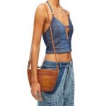 LOEWE MINI SLIT CLUTCH BAG IN RAFFIA AND CALFSKIN