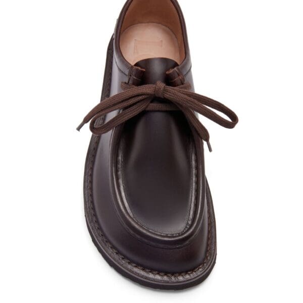 Discover timeless elegance with the Loewe Faro Lace-Up, crafted in exquisite pull-up calfskin leather. Perfect for refined style seekers.