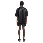 NANUSHKA MANCE RAFFIA-TRIMMED OKOBOR ALT-LEATHER JACKET BLACK