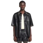 NANUSHKA MANCE RAFFIA-TRIMMED OKOBOR ALT-LEATHER JACKET BLACK