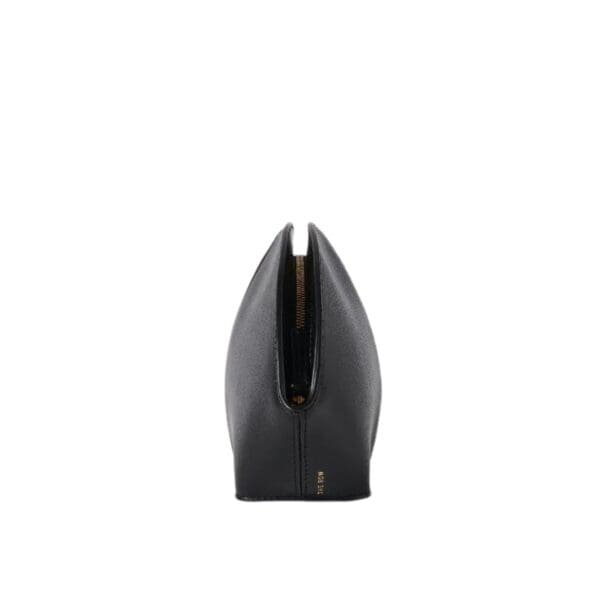 THE ROW MEL CLUTCH IN LEATHER