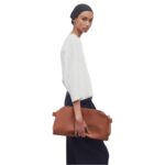 THE ROW MARGAUX EW CLUTCH IN LEATHER