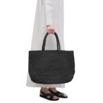 THE ROW OREGON BAG IN RAFFIA