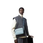 GUCCI GG RUBBER EFFECT CROSSBODY BAG IN LIGHT BLUE