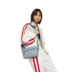 GUCCI GG RUBBER EFFECT CROSSBODY BAG IN LIGHT BLUE