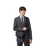 GUCCI GG RUBBER EFFECT CROSSBODY BAG IN BLACK LEATHER