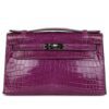 PRE-OWNED HERMÈS KELLY POCHETTE VIOLET SHINY NILOTICUS CROCODILE PALLADIUM HARDWARE