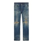 CELINE KURT JEANS IN DESTROYED BLUE MARBLE DENIM