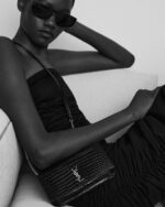 CASSANDRE PHONE HOLDER IN SHINY CROCODILE EMBOSSED LEATHER