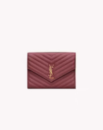 CASSANDRE MATELASSE FLAP POUCH IN LAMBSKIN