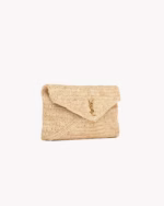 CASSANDRE LARGE ENVELOPE POUCH IN RAFFIA